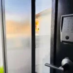 Keyless door lock on a modern house entrance.