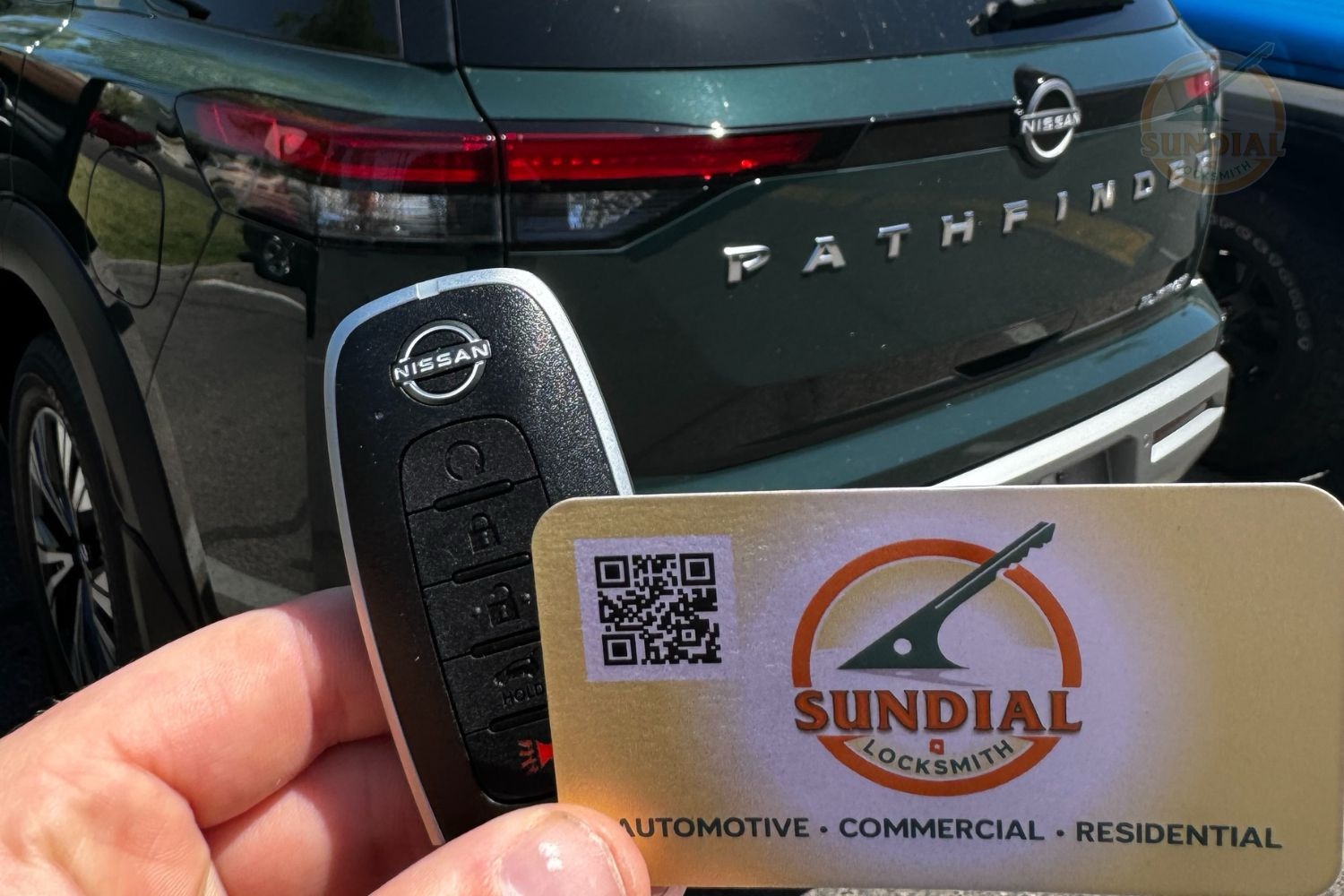A locksmith technician performing oem car key replacement programming on an SUV in a sunny Arizona parking lot